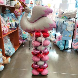 PINK STORK BALLOON COMPOSITION IN A COLUMN FOR A NEWBORN GIRLPINK STORK BALLOON COMPOSITION IN A COLUMN FOR A NEWBORN GIRL